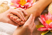Relaxation, Wellbeing and Stress Relief Packages. Library Image: Foot with Flower